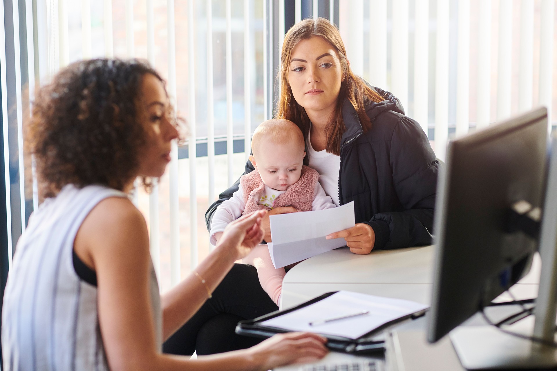 young mother with support worker